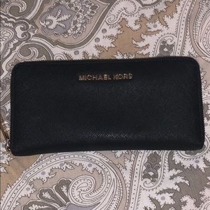 Michael Kors black zip around wallet